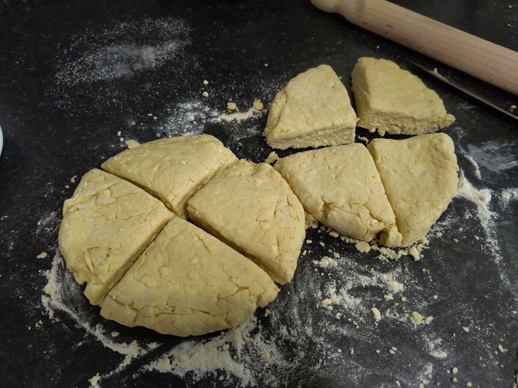 2 rounds of dough cut into quarters
